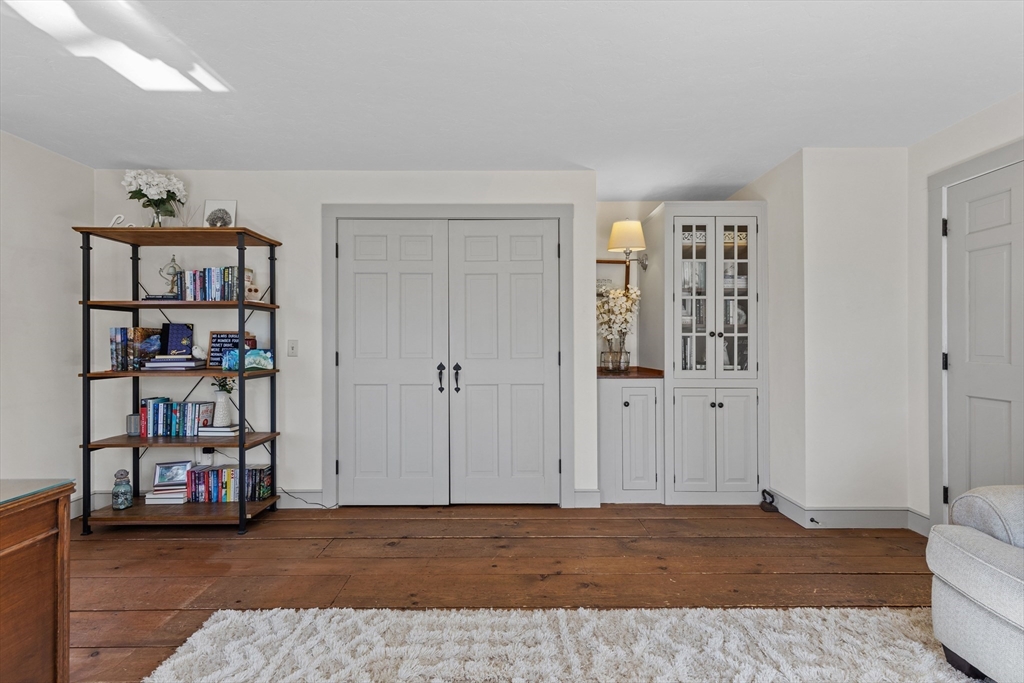 57 Whitewood Road Milford, MA 01757 - Photo 28 of 40 a view of bedroom with furniture and closet