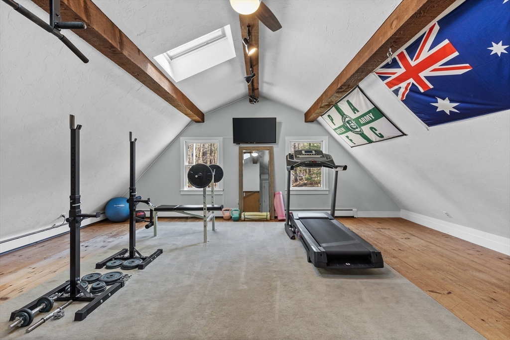 57 Whitewood Road Milford, MA 01757 - Photo 35 of 40 a view of a room with gym equipment