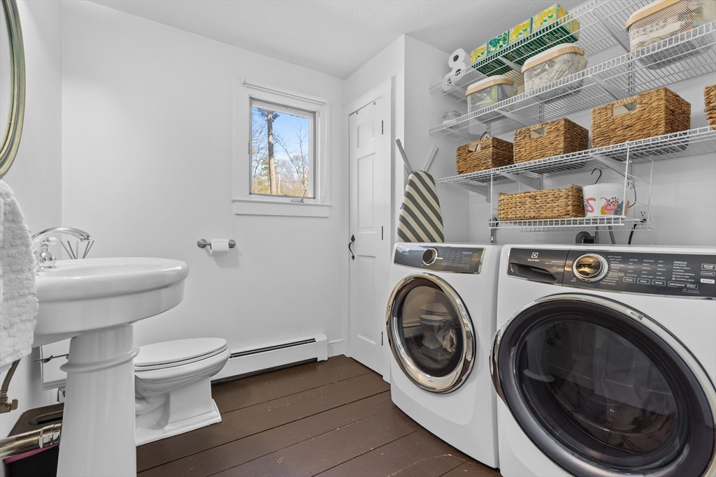 57 Whitewood Road Milford, MA 01757 - Photo 37 of 40 a bathroom with a toilet and a sink
