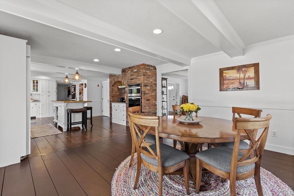 57 Whitewood Road Milford, MA 01757 - Photo 10 of 40 a dining room with furniture and wooden floor