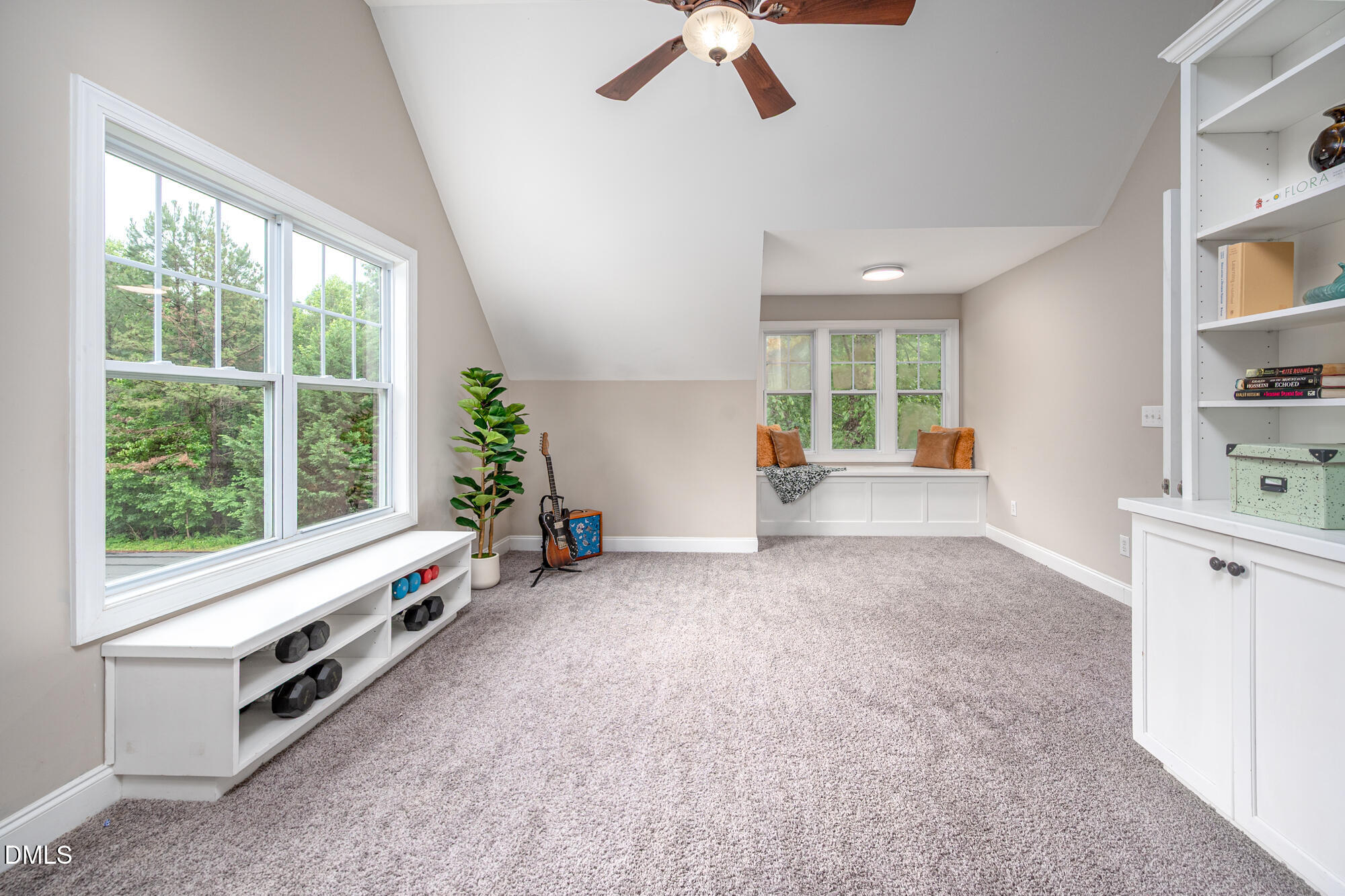 726 Ruth Circle Fuquay-Varina, NC 27526 - Photo 39 of 61 a view of an empty room with a window and storage