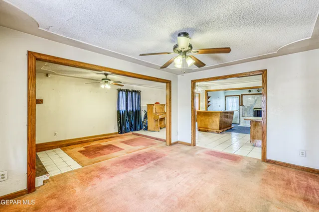 a view of an empty room and window