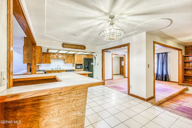 a view of a kitchen cabinets and entryway