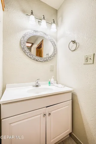 an aerial view of a house with a backyard