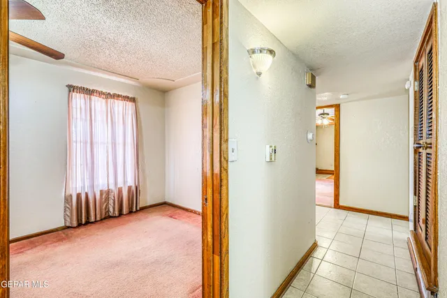 a view of bathroom with a shower and a sink