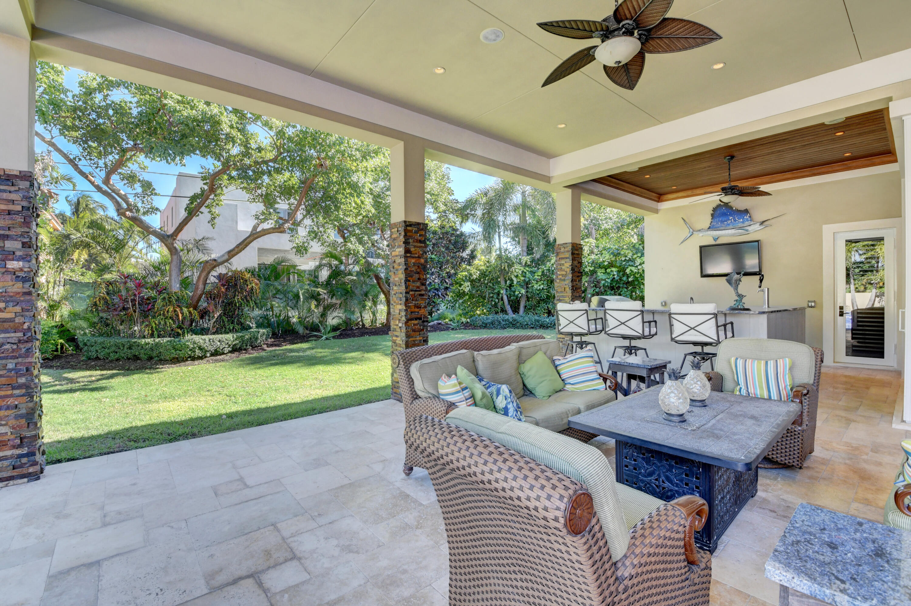 1130 Spanish River Road Boca Raton, FL 33432 - Photo 23 of 59 a living room with furniture and a large window
