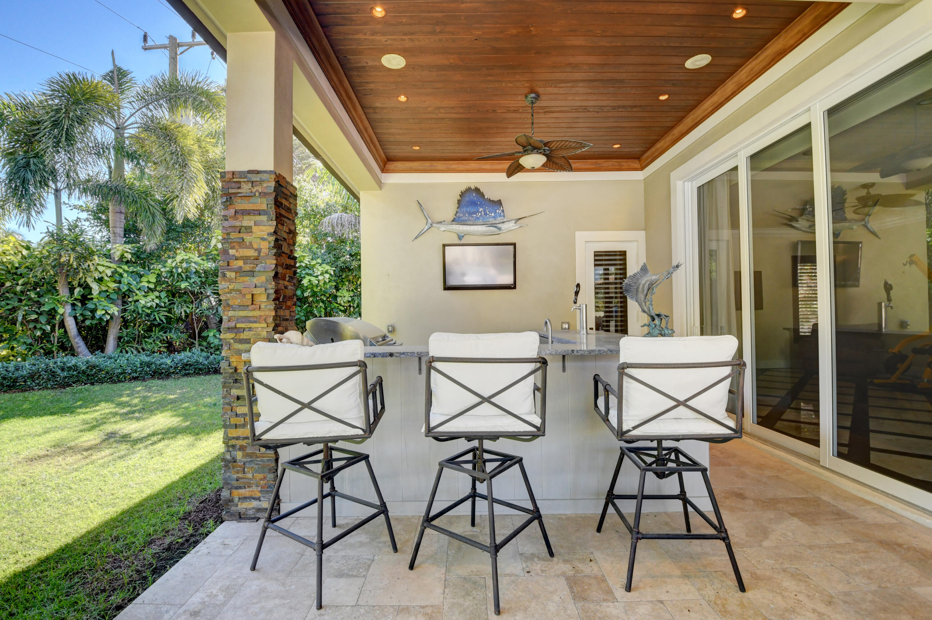 1130 Spanish River Road Boca Raton, FL 33432 - Photo 25 of 59 a view of an outdoor seating area