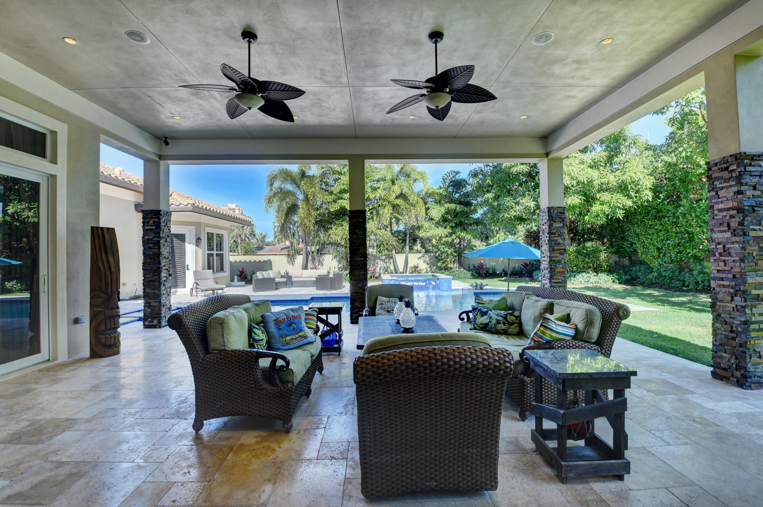 1130 Spanish River Road Boca Raton, FL 33432 - Photo 26 of 59 a living room with furniture and a large window