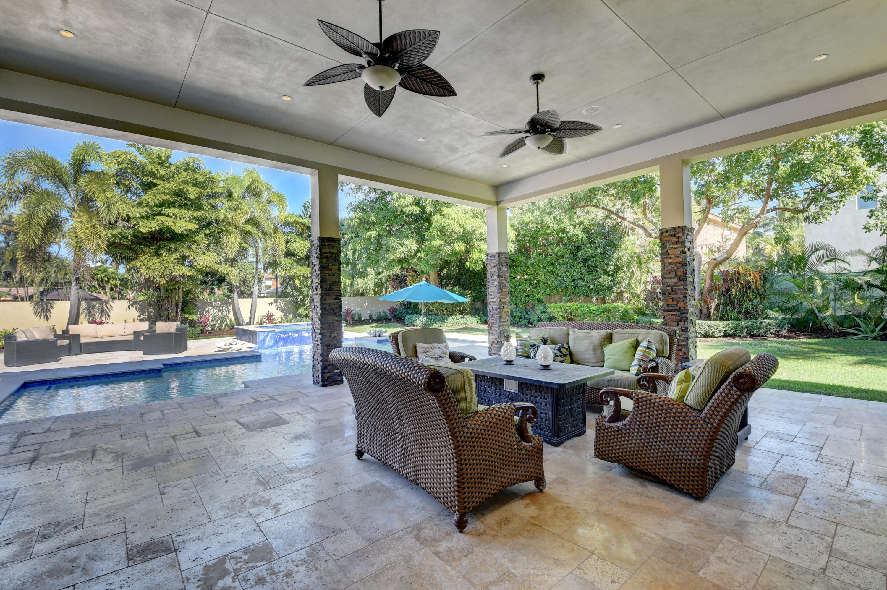 1130 Spanish River Road Boca Raton, FL 33432 - Photo 30 of 59 a living room with furniture and a large window