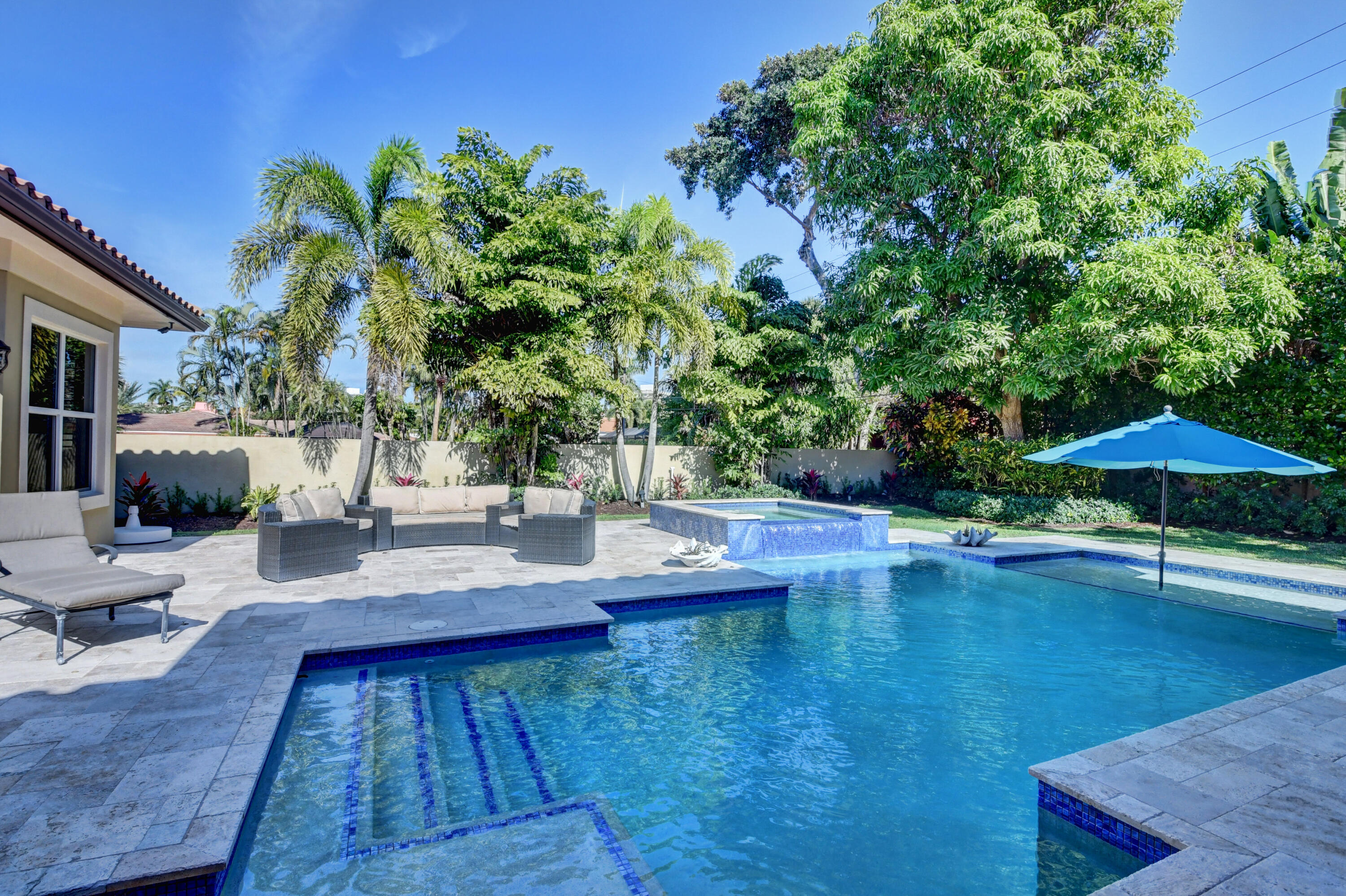 1130 Spanish River Road Boca Raton, FL 33432 - Photo 31 of 59 swimming pool view with a seating space