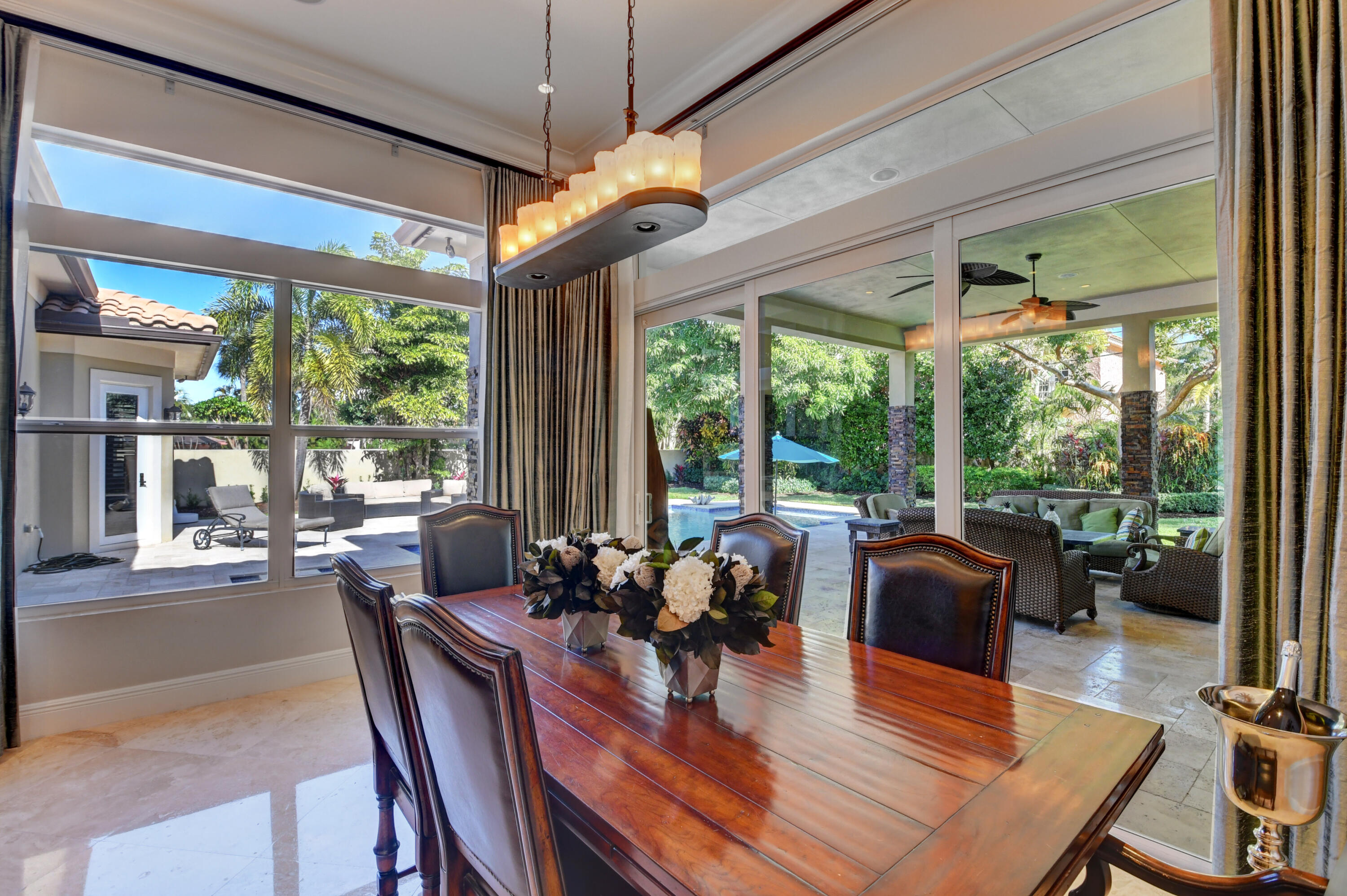 1130 Spanish River Road Boca Raton, FL 33432 - Photo 46 of 59 a view of a dining room with furniture window and outside view