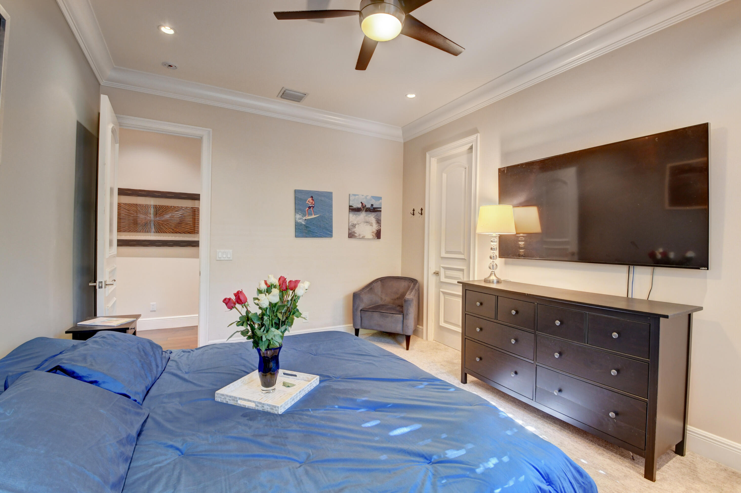 1130 Spanish River Road Boca Raton, FL 33432 - Photo 50 of 59 a living room with furniture and a flat screen tv