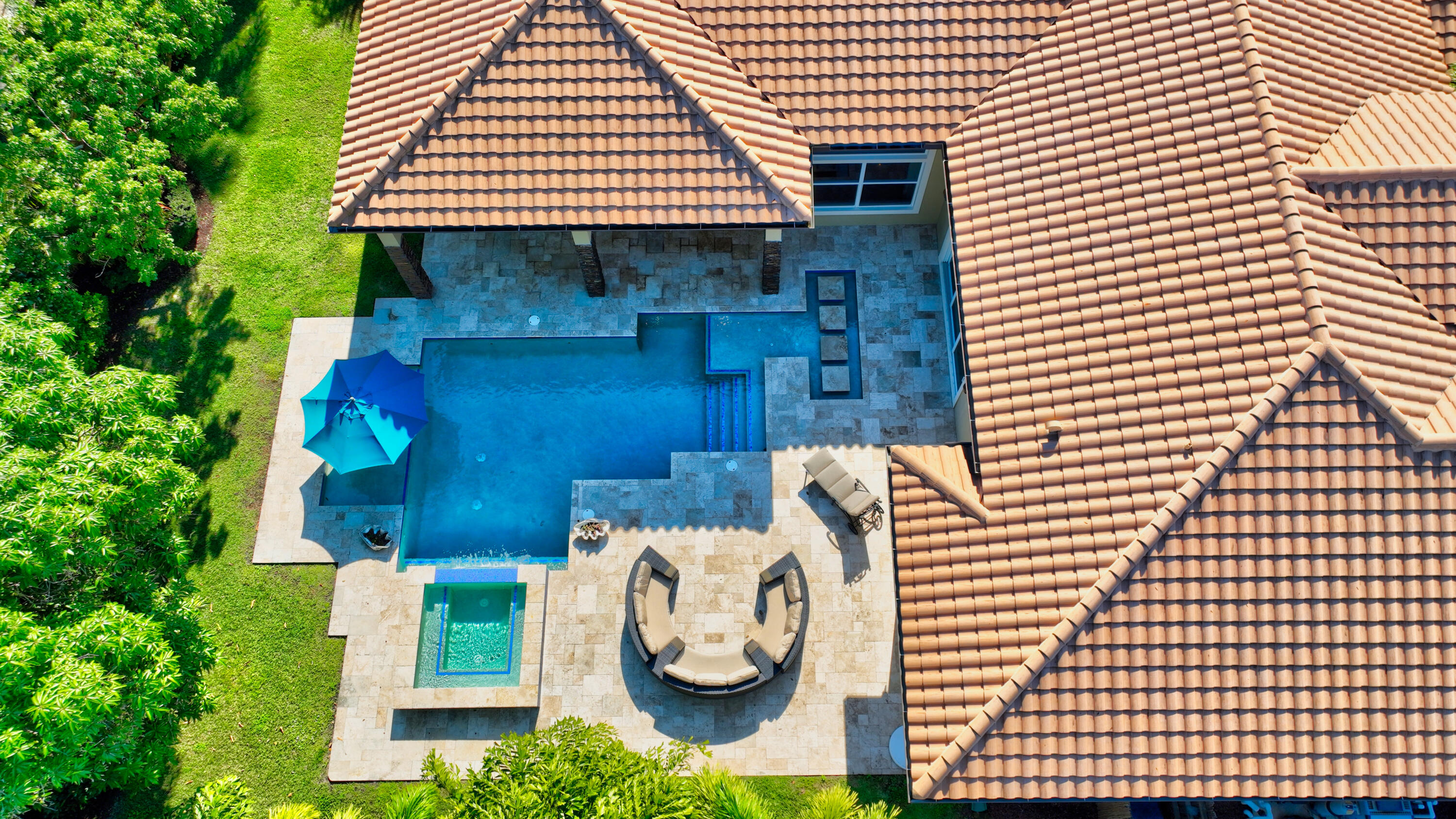 1130 Spanish River Road Boca Raton, FL 33432 - Photo 56 of 59 a front view of a house with garden