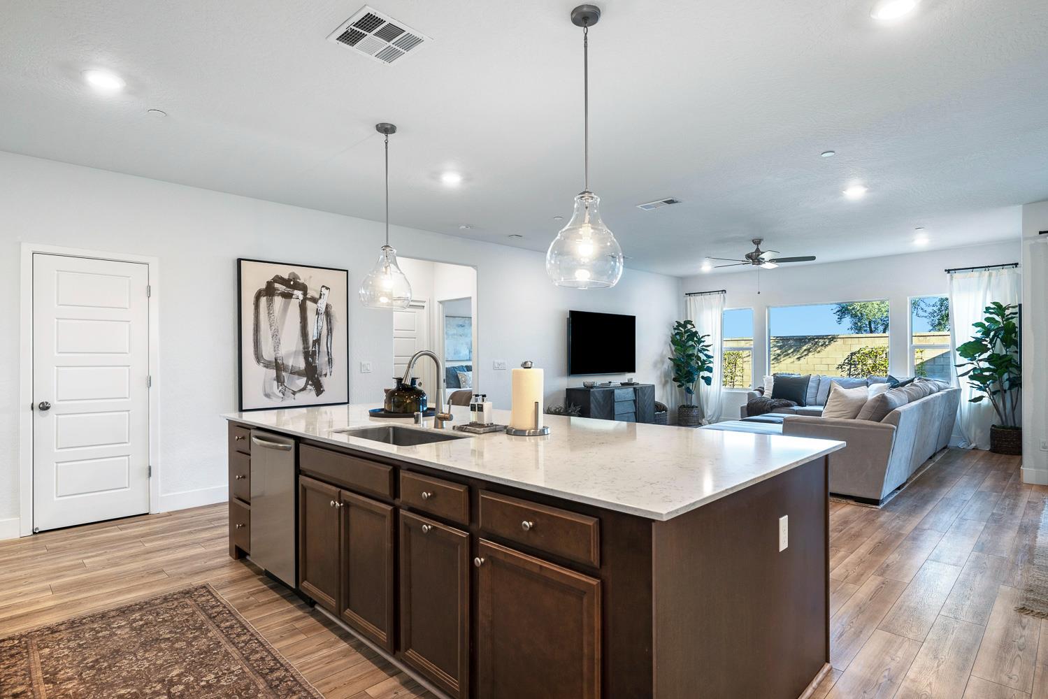 601 Wishon Avenue Madera, CA 93636 - Photo 13 of 33 a kitchen with sink and center island