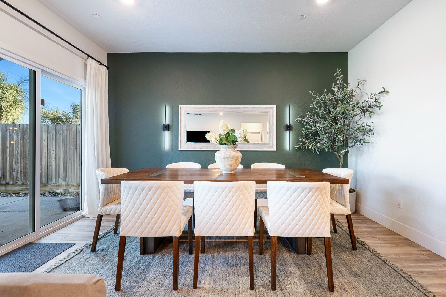 601 Wishon Avenue Madera, CA 93636 - Photo 15 of 33 a dining room with furniture and wooden floor