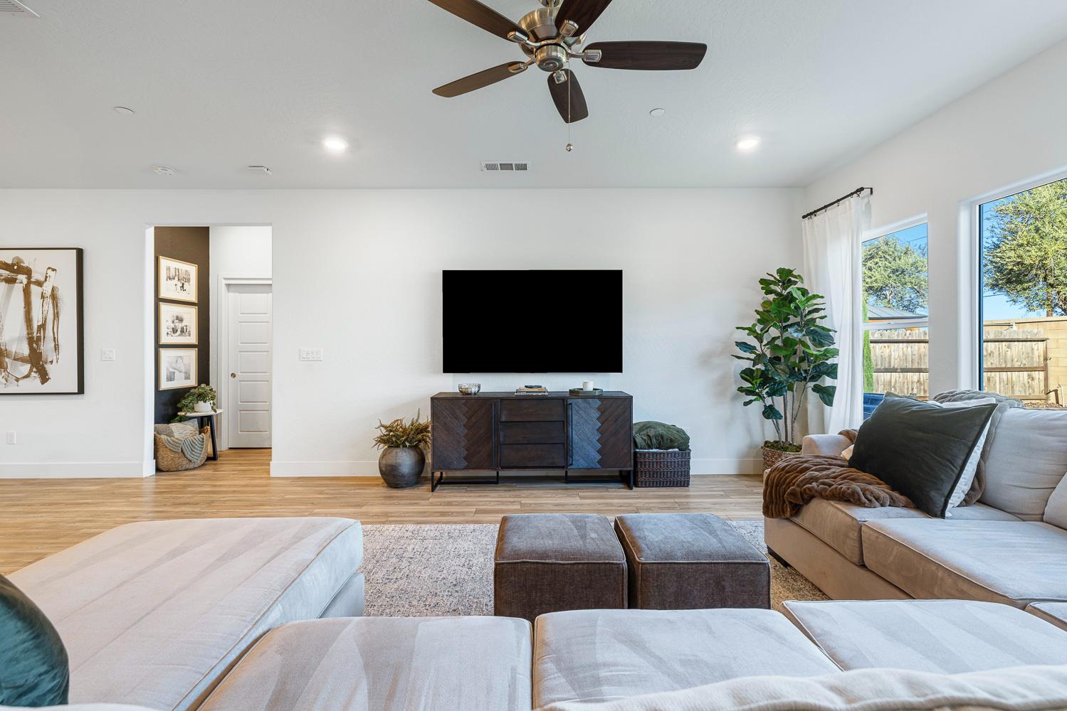 601 Wishon Avenue Madera, CA 93636 - Photo 17 of 33 a living room with furniture and a flat screen tv