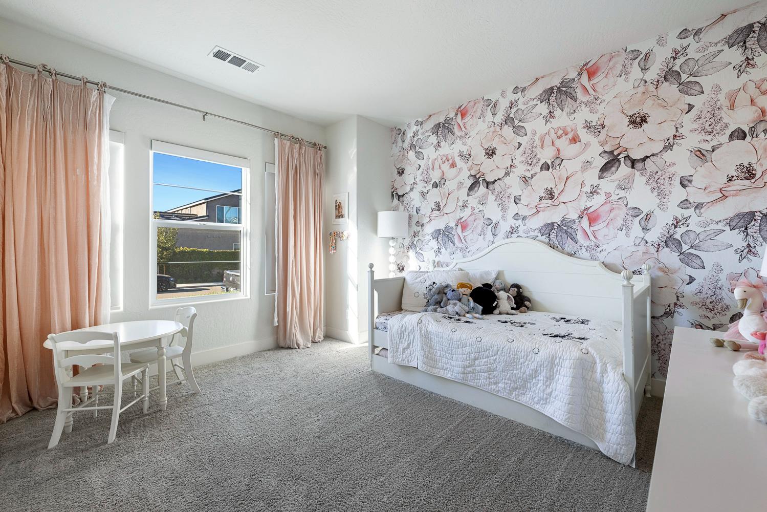 601 Wishon Avenue Madera, CA 93636 - Photo 25 of 33 a bedroom with furniture and a window