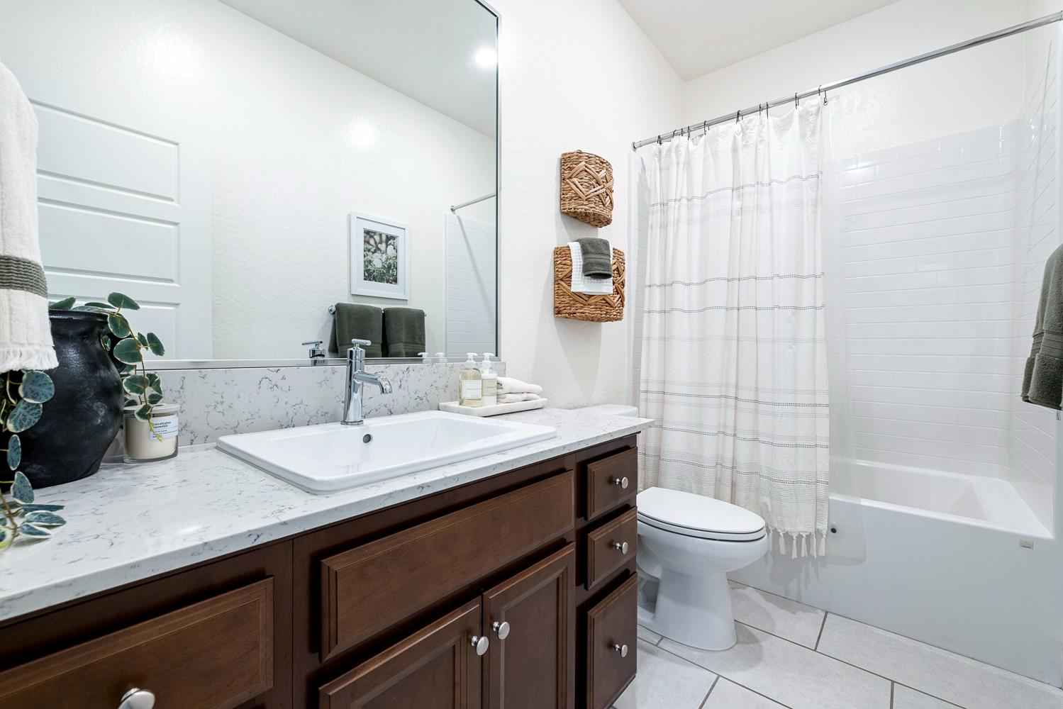 601 Wishon Avenue Madera, CA 93636 - Photo 26 of 33 a bathroom with a sink a toilet and shower