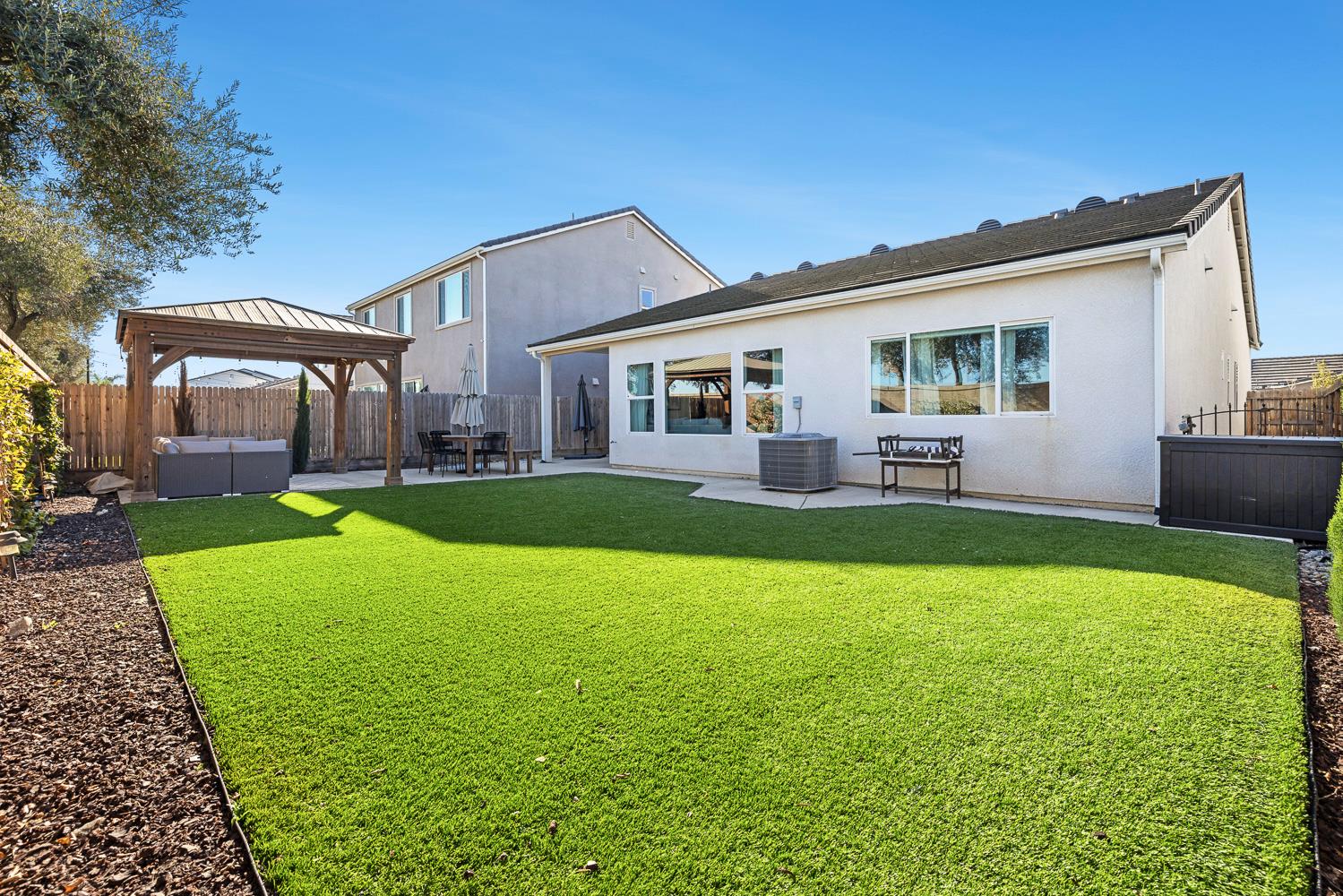 601 Wishon Avenue Madera, CA 93636 - Photo 30 of 33 a house view with swimming pool in front of it