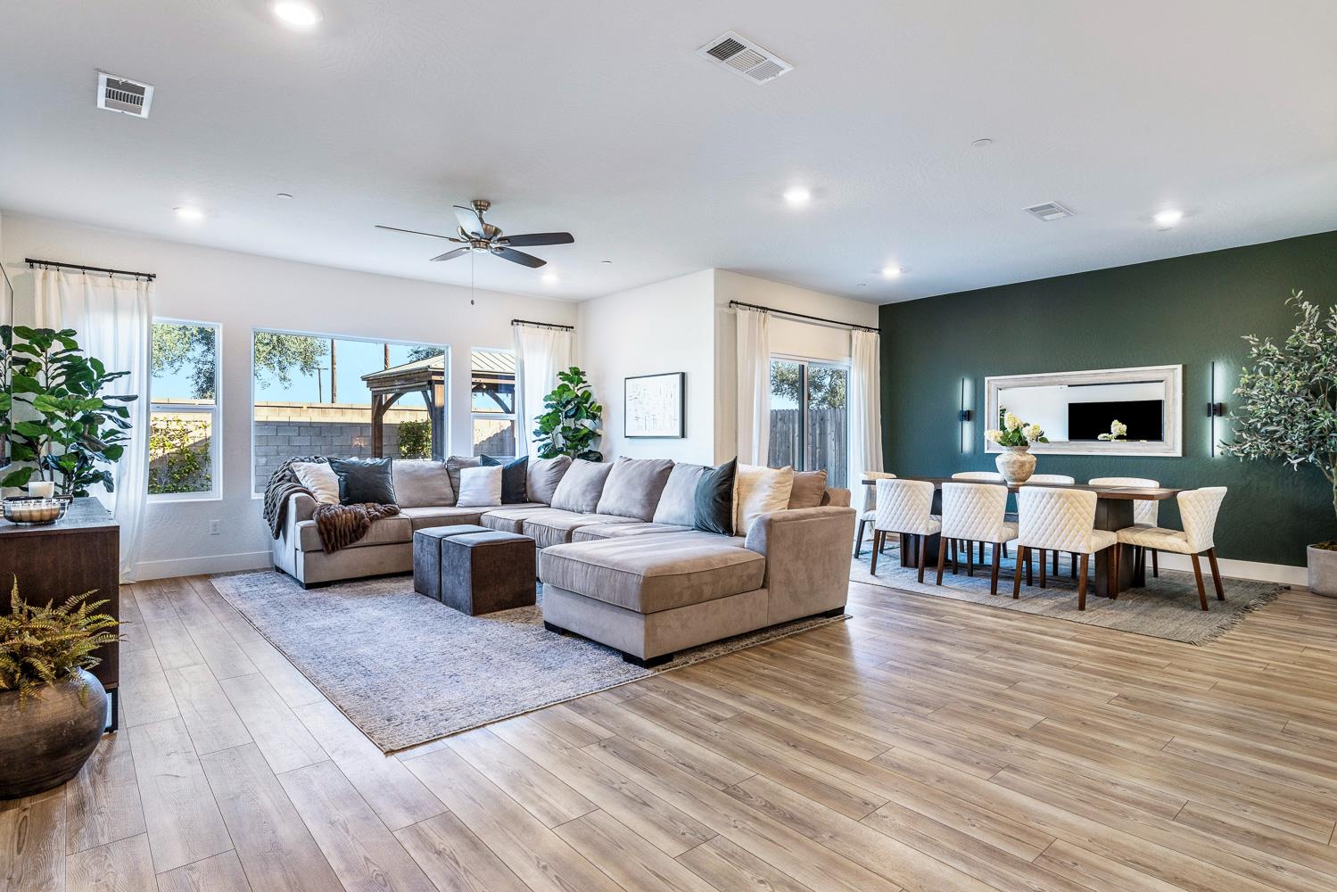 601 Wishon Avenue Madera, CA 93636 - Photo 6 of 33 a living room with furniture and wooden floor