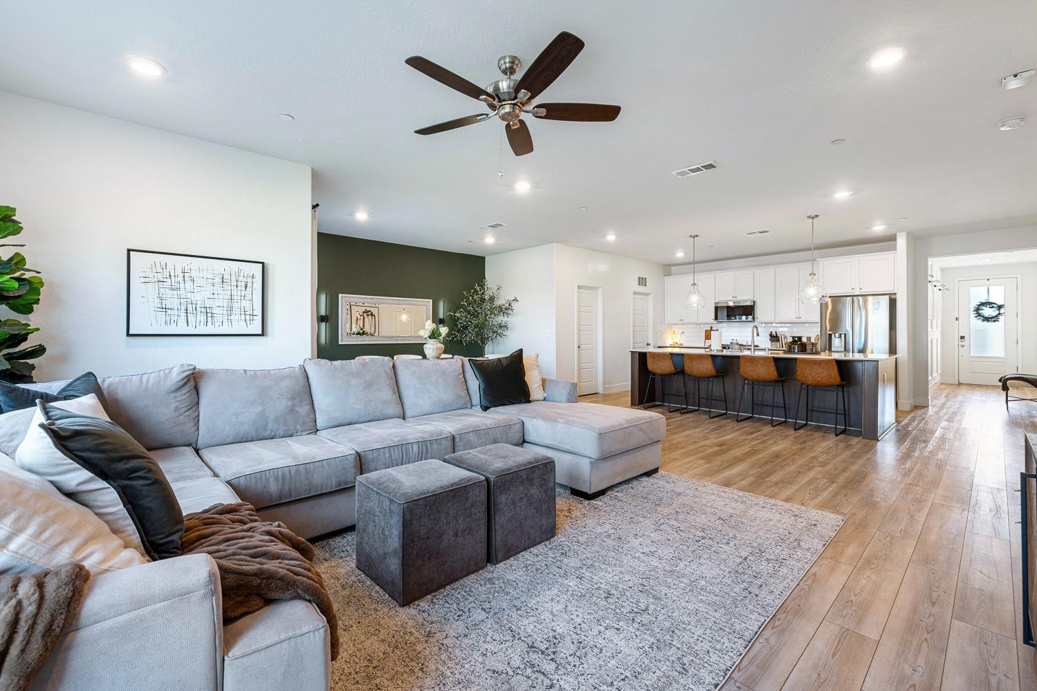 601 Wishon Avenue Madera, CA 93636 - Photo 7 of 33 a living room with furniture kitchen view and a table