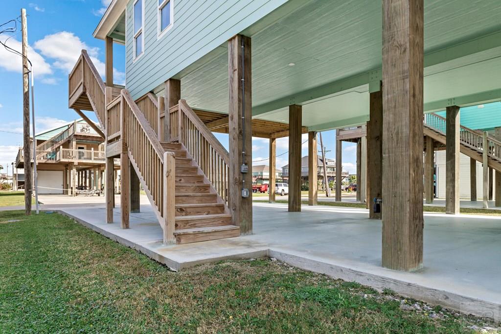 971 Tidelands Crystal Beach, TX 77650 - Photo 11 of 38 a view of a house with a yard