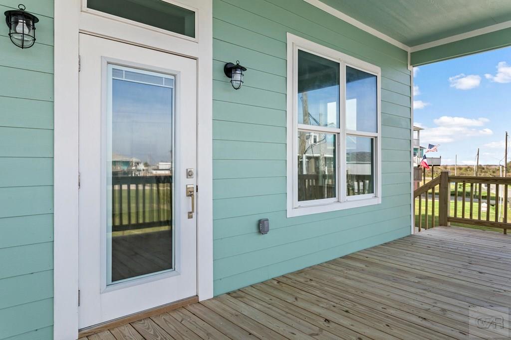 971 Tidelands Crystal Beach, TX 77650 - Photo 15 of 38 a view of a house with a balcony
