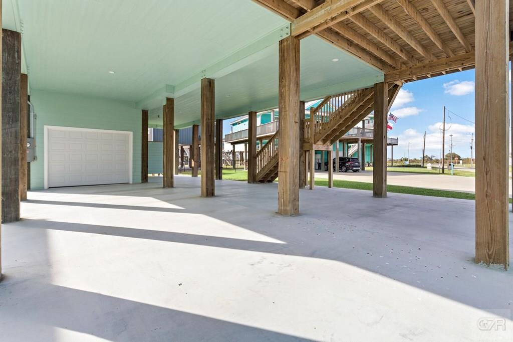 971 Tidelands Crystal Beach, TX 77650 - Photo 35 of 38 a view of a building with a park