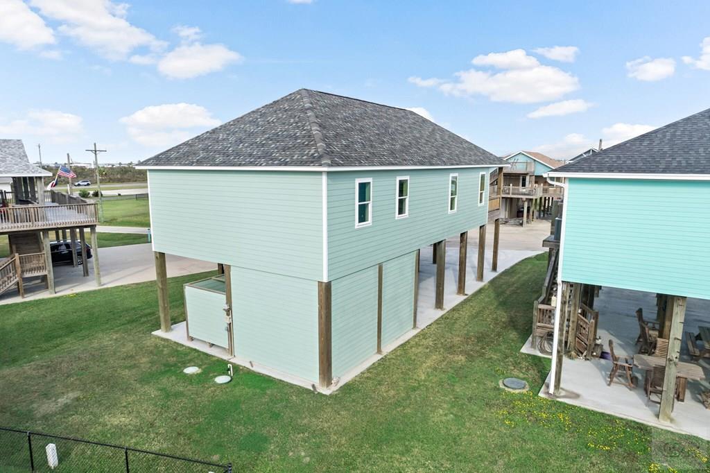 971 Tidelands Crystal Beach, TX 77650 - Photo 38 of 38 a view of a house with backyard