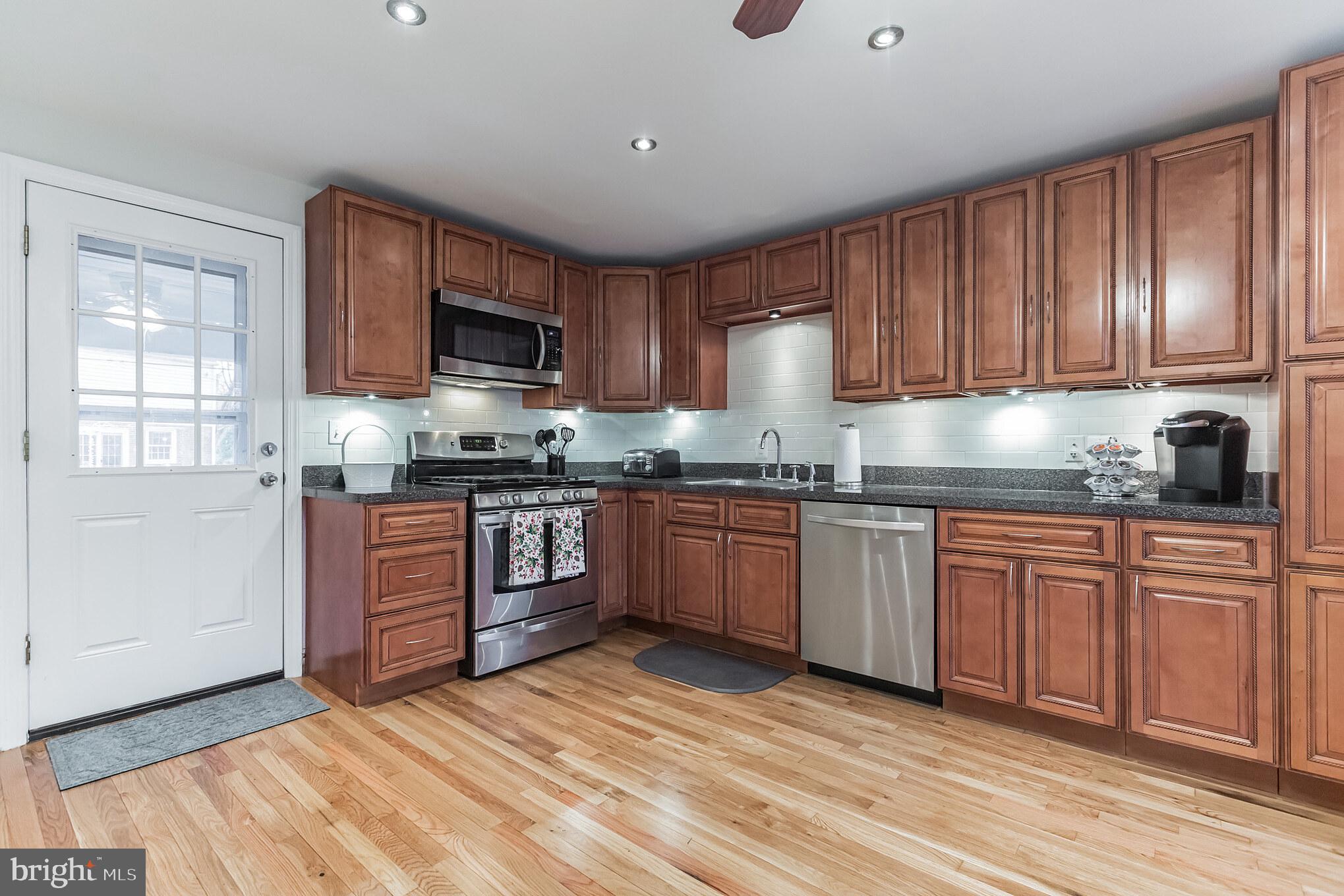 121 Heatherwood Road Havertown, PA 19083 - Photo 13 of 39 Kitchen Rear Exterior Door to Driveway