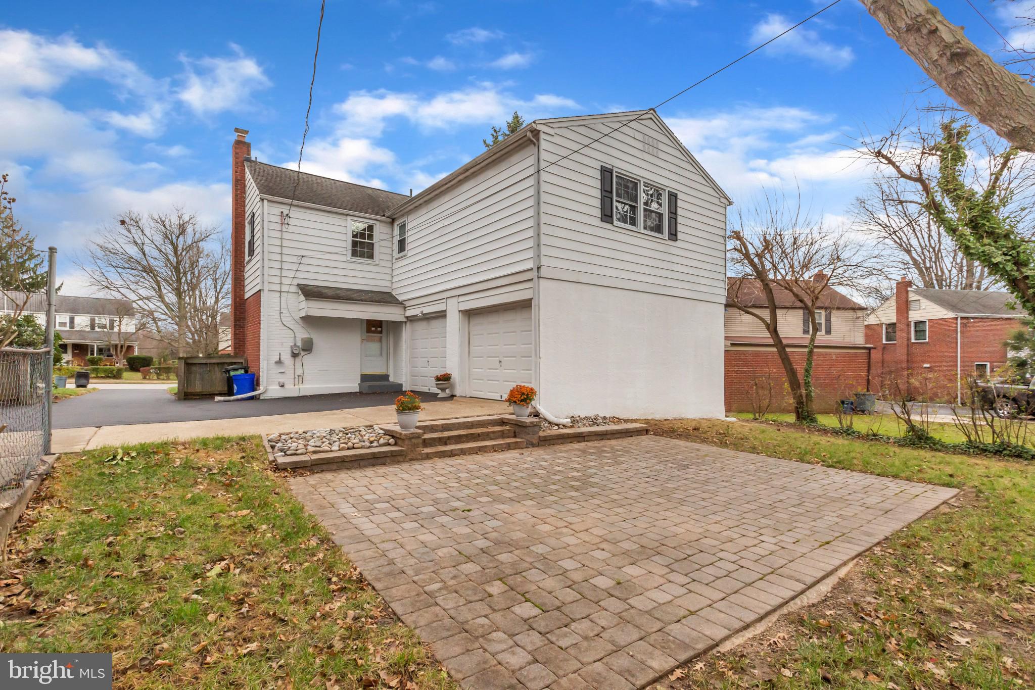 121 Heatherwood Road Havertown, PA 19083 - Photo 7 of 39 Back Exterior Paver Patio