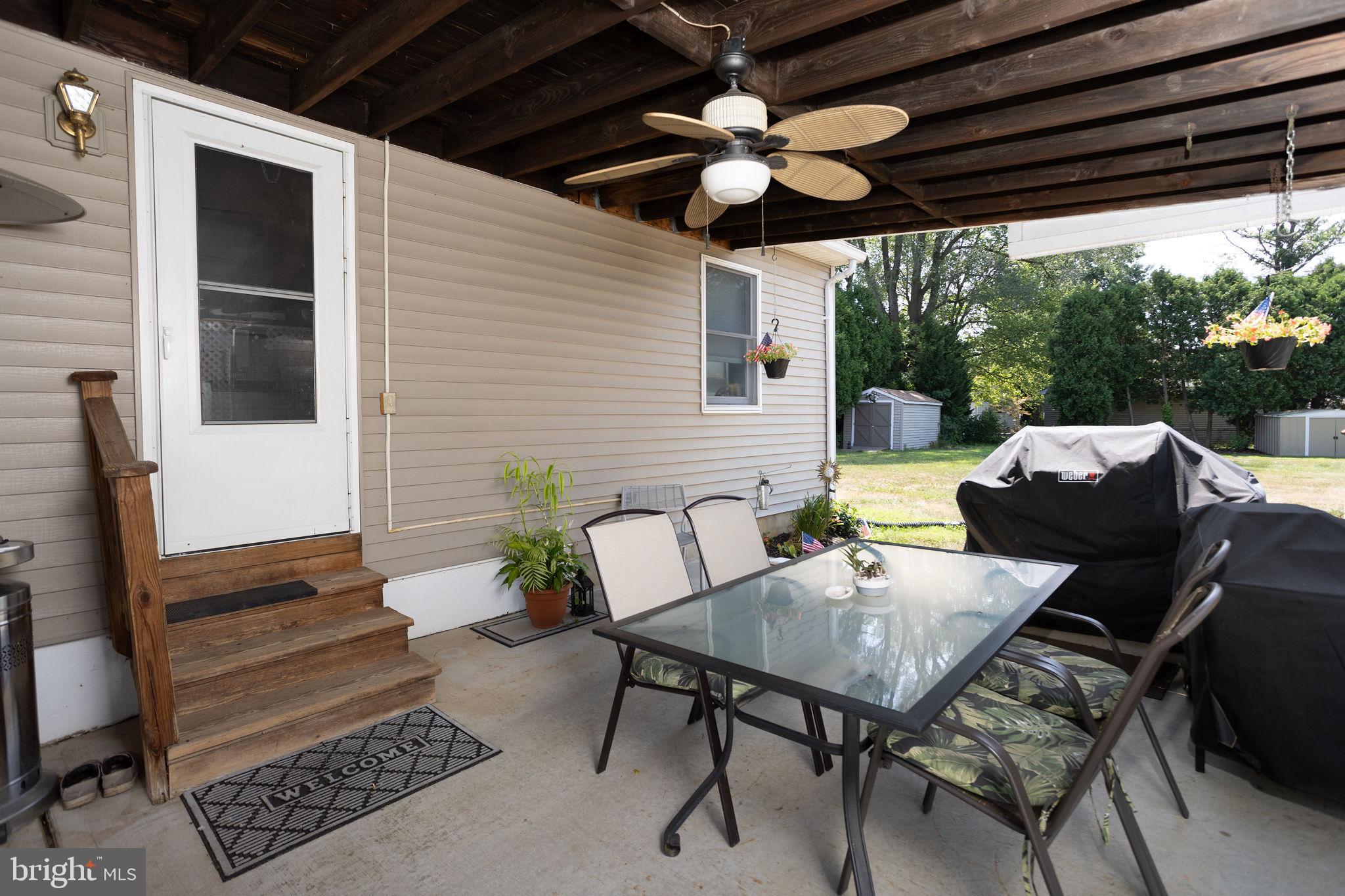 9 Maguire Road Hamilton, NJ 08690 - Photo 29 of 34 Side Entrance Carport Ceiling Fan & Grilling Area