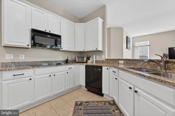 a view of cabinets and window