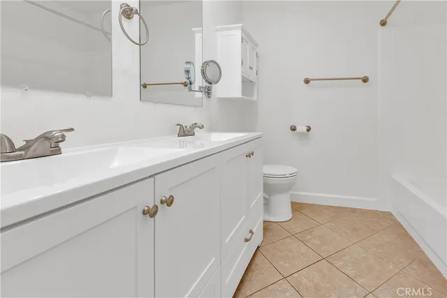 a view of balcony with wooden floor