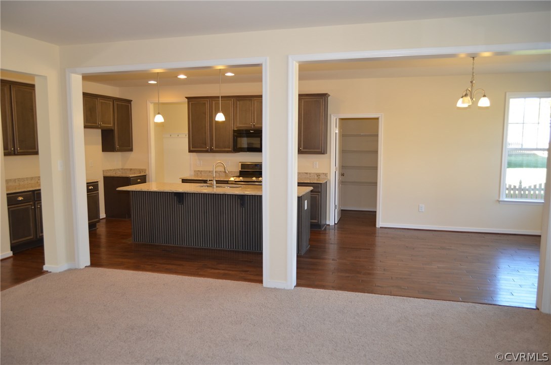 8607 Beyer Road Chesterfield, VA 23832 - Photo 17 of 28 Family Room/Kitchen - Photo is from the builders l