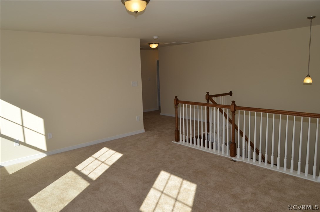 8607 Beyer Road Chesterfield, VA 23832 - Photo 25 of 28 Loft - Photo is from the builders library and is s