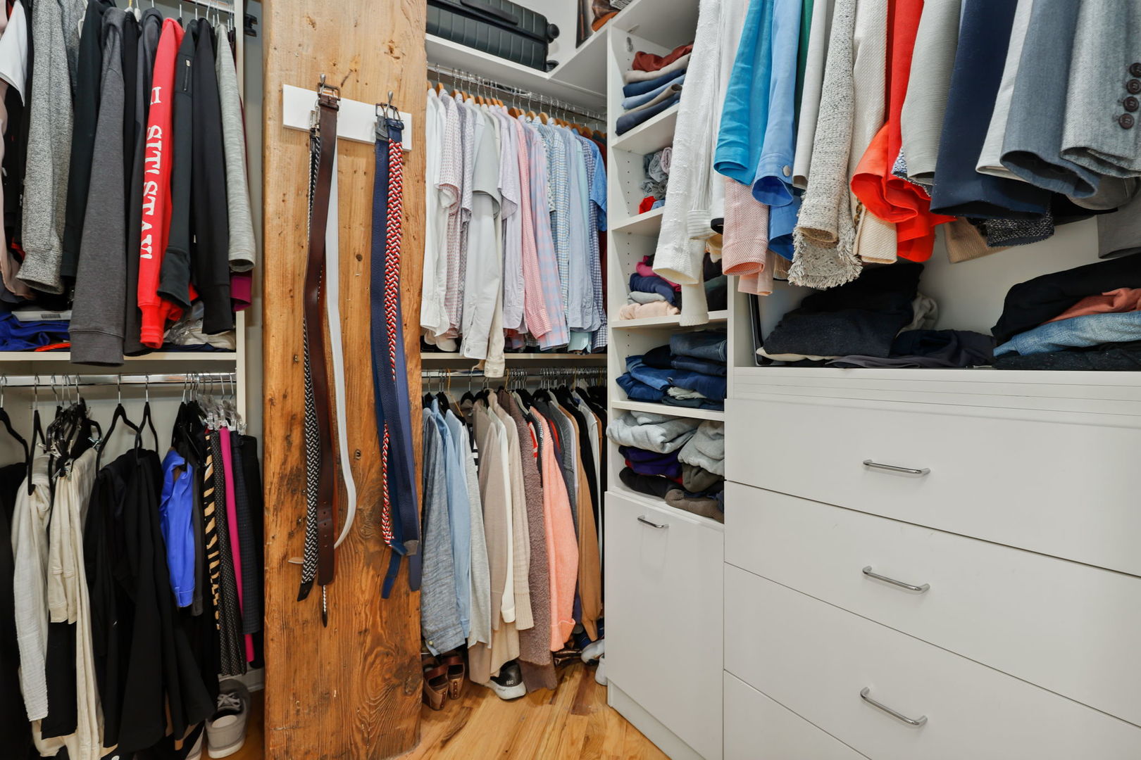 1040 West Adams Street, Unit 224 Chicago, IL 60607 - Photo 17 of 32 a view of walk in closet with clothes