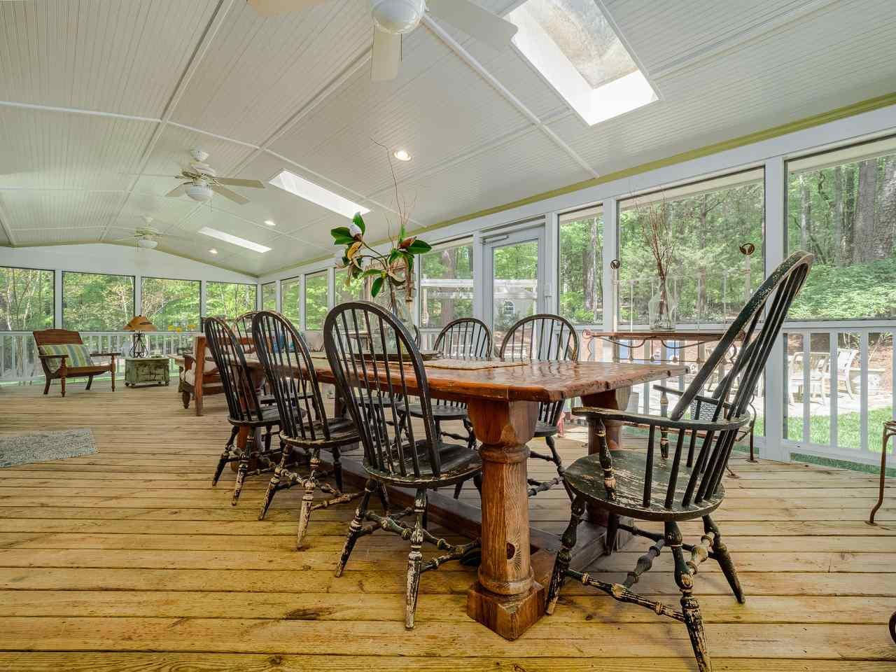 12329 Chastain Drive Raleigh, NC 27614 - Photo 12 of 30 Can you imagine the memories created here? 3 ceiling fans & beadboard ceiling! Massive Screened Porch