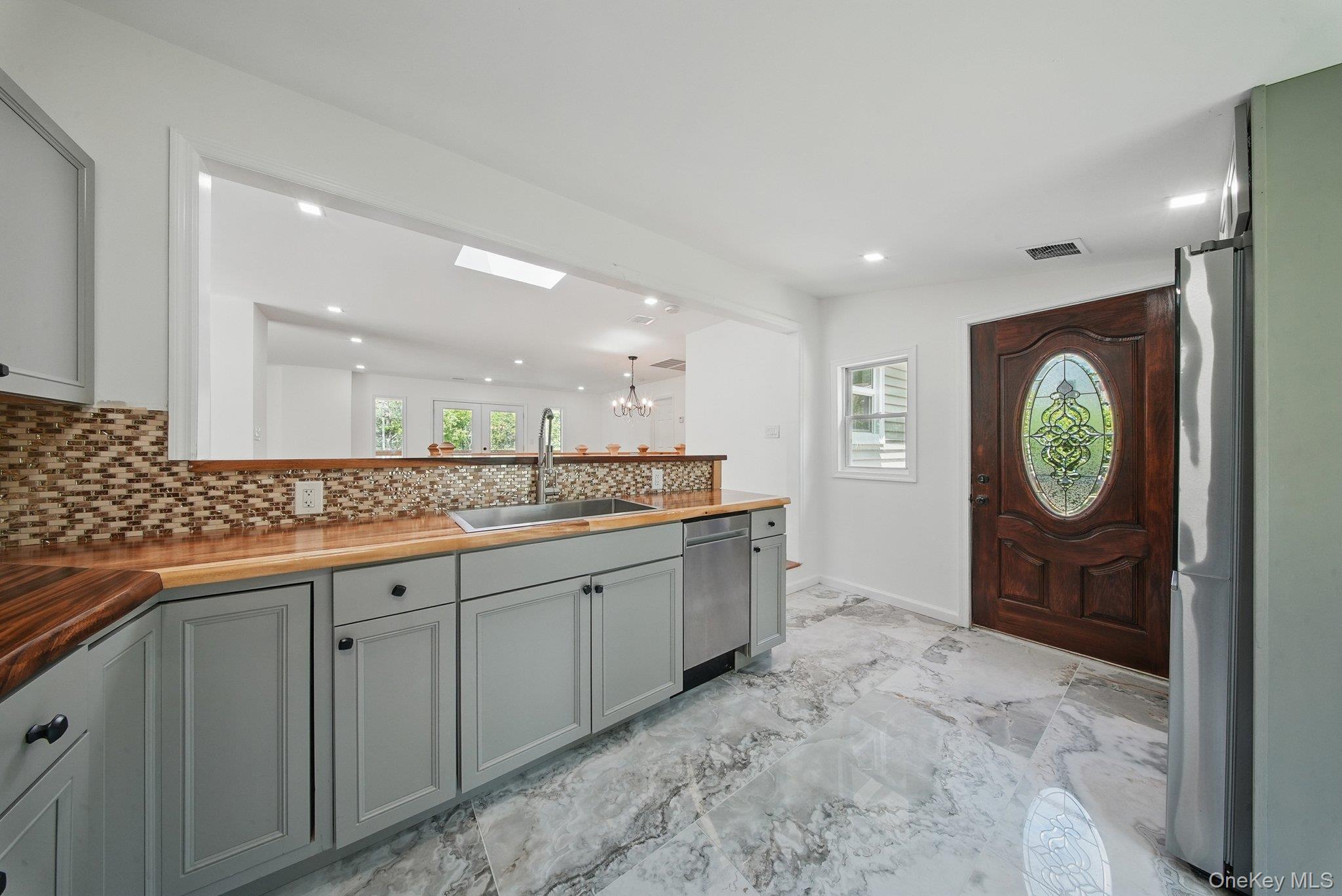 206 High Road Glen Spey, NY 12737 - Photo 26 of 42 a bathroom with a sink a vanity and mirror