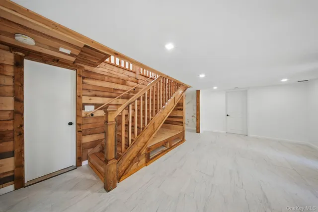 a view of an entryway with staircase