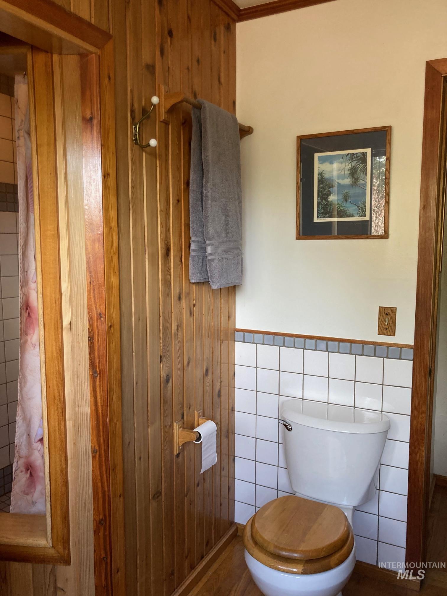 266 Falcon Ridge Road Kooskia, ID 83539 - Photo 16 of 50 Vertical wood paneling with a natural finish