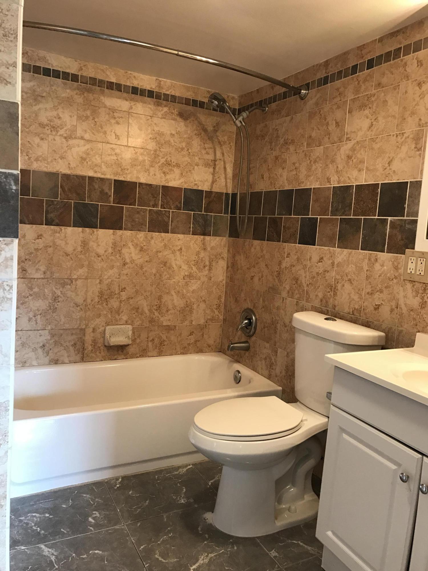 9354 Southwest 3rd Street, Unit 604 Boca Raton, FL 33428 - Photo 8 of 12 Guest Bathroom