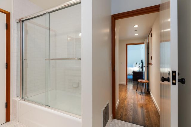 a view of a bedroom from the hallway