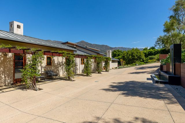 a view of a patio with a backyard