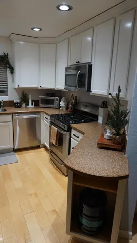 a bathroom with a sink toilet and a mirror