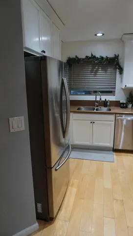 a bathroom with a sink toilet and vanity