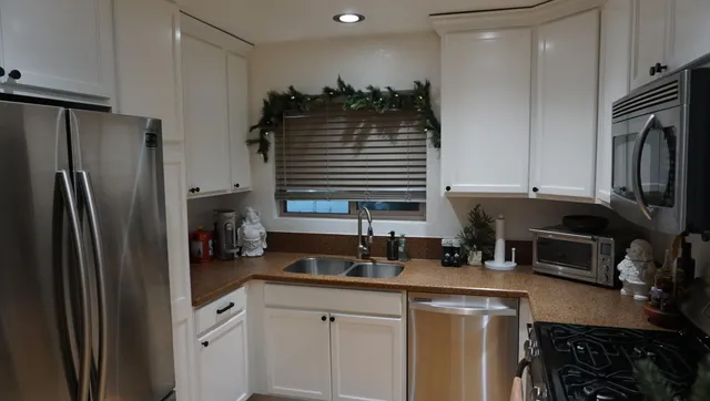 a bed room with a bed and a window