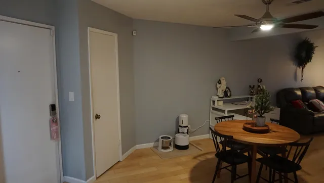 a kitchen with kitchen island a sink stainless steel appliances and cabinets