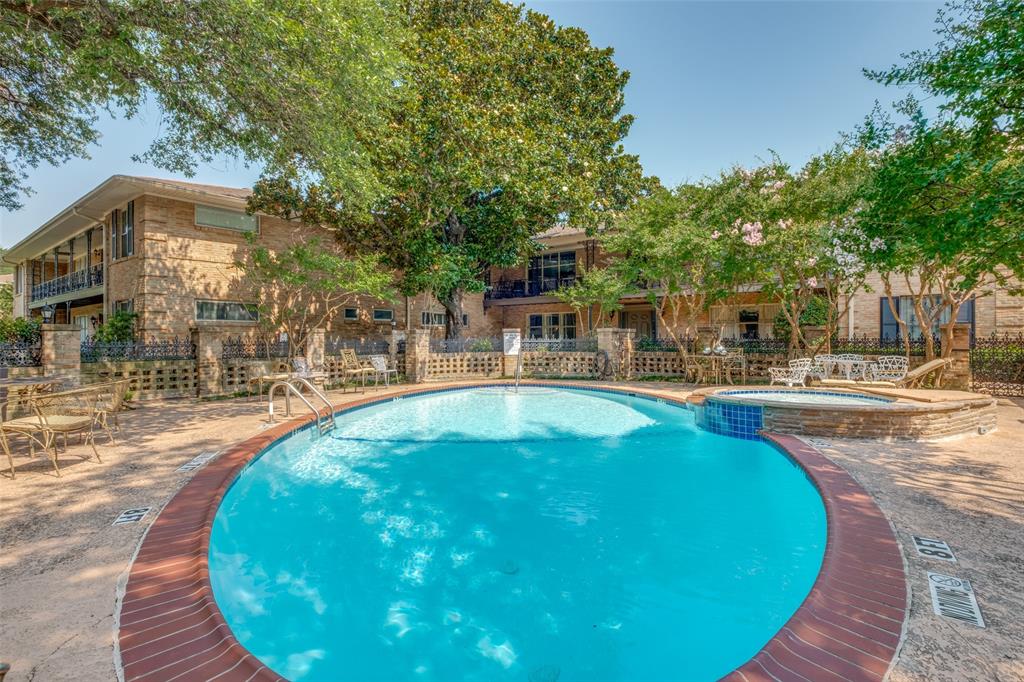 6131 Bandera Avenue, Unit A Dallas, TX 75225 - Photo 11 of 13 a view of a swimming pool with outdoor seating