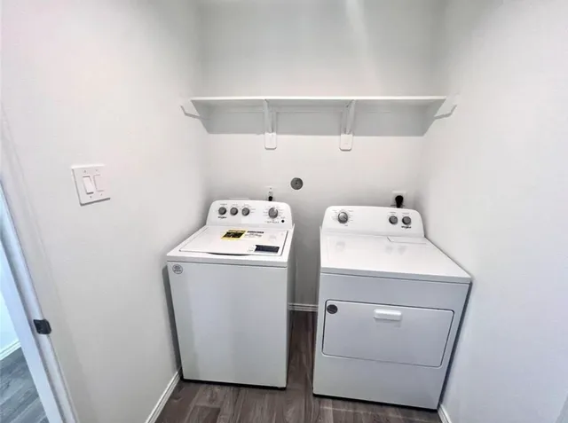 a utility room with dryer and washer